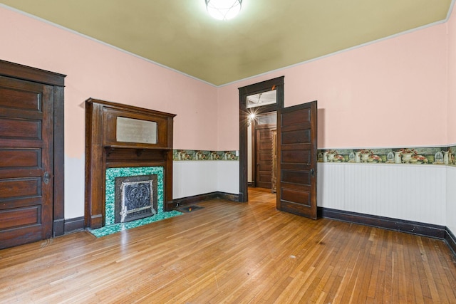 unfurnished living room featuring light hardwood / wood-style flooring