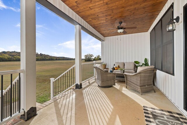 view of patio / terrace with ceiling fan and outdoor lounge area