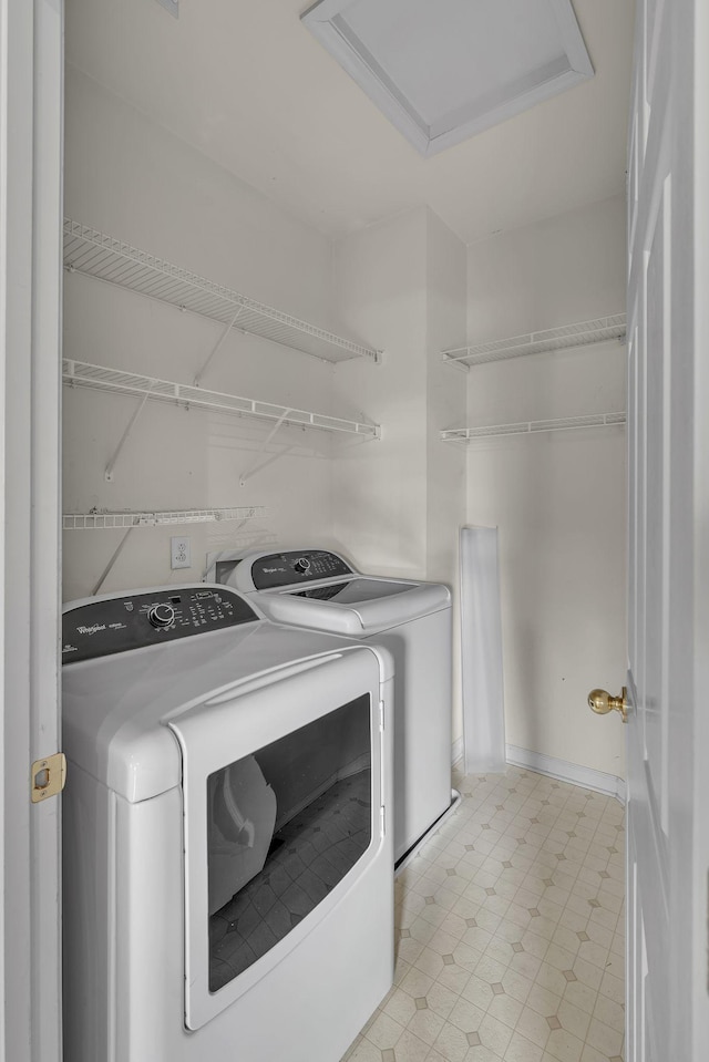 washroom featuring washer and dryer