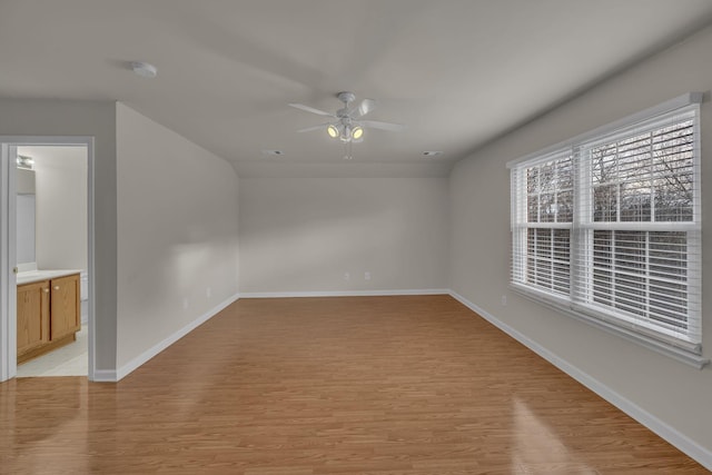 interior space with ceiling fan and light wood-type flooring