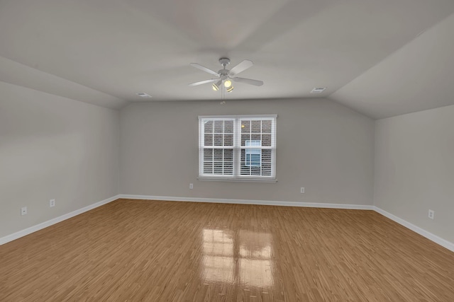 bonus room with ceiling fan, lofted ceiling, and light hardwood / wood-style floors