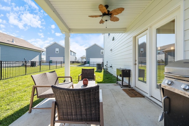 view of patio / terrace with ceiling fan and grilling area