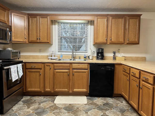 kitchen with sink and stainless steel appliances