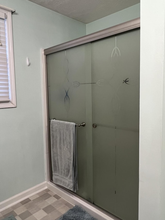 bathroom with a textured ceiling