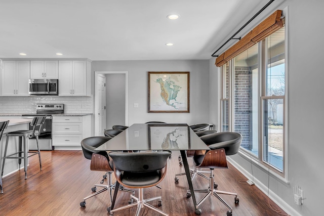 dining room featuring hardwood / wood-style flooring