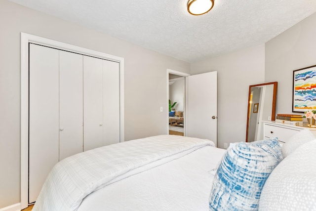 bedroom featuring a textured ceiling