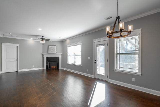 unfurnished living room with crown molding, ceiling fan with notable chandelier, and dark hardwood / wood-style floors