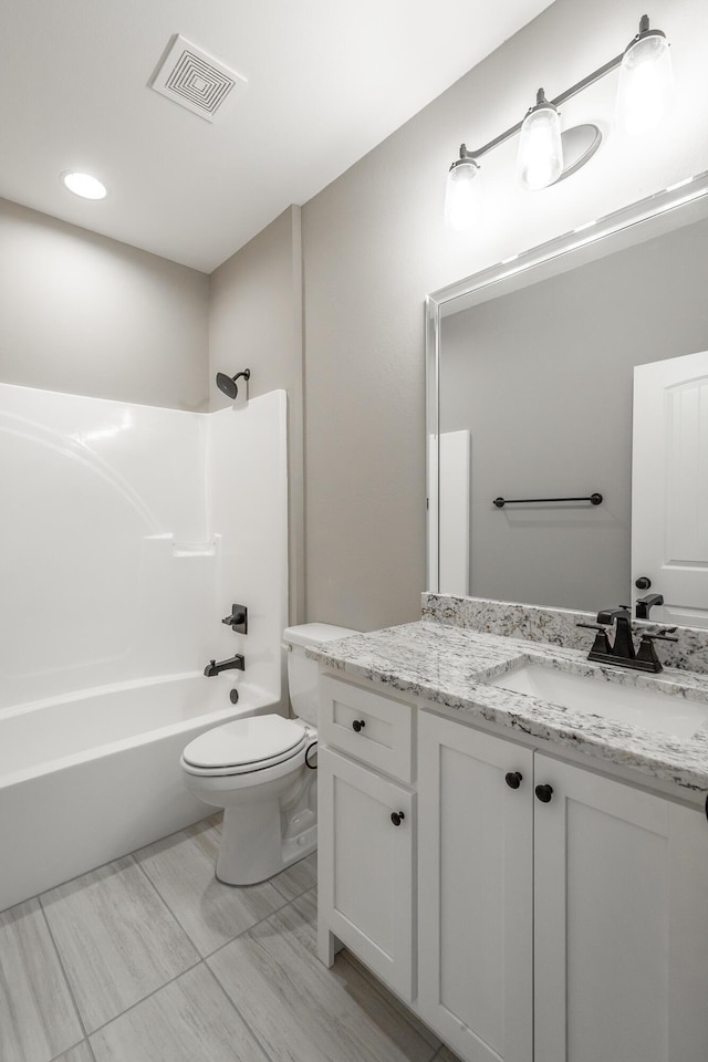 full bathroom with shower / tub combination, toilet, and vanity