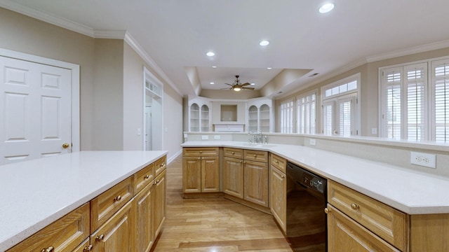 kitchen featuring sink, ceiling fan, dishwasher, ornamental molding, and light wood-type flooring