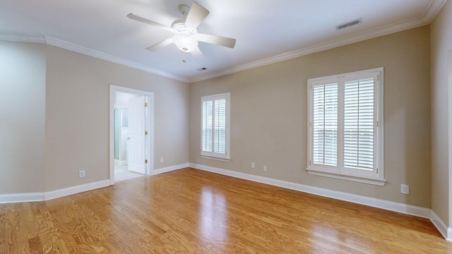 unfurnished room with ceiling fan, ornamental molding, and light hardwood / wood-style floors