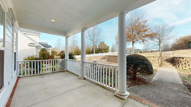 balcony featuring covered porch