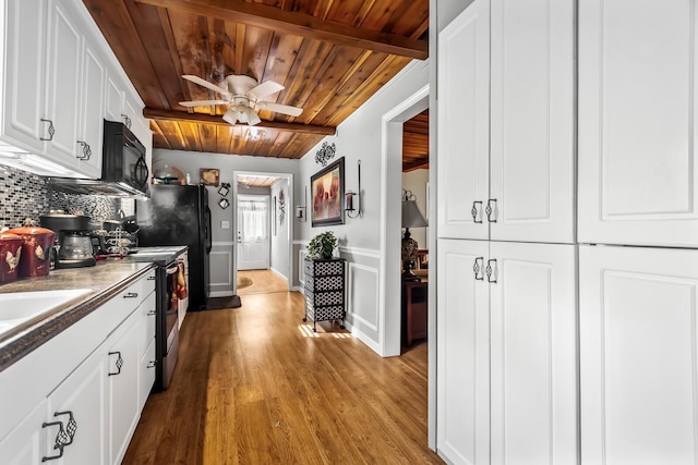 kitchen featuring tasteful backsplash, light hardwood / wood-style floors, electric range, white cabinets, and wooden ceiling