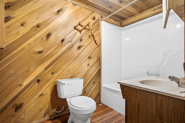 full bathroom with toilet, vanity, wood walls, hardwood / wood-style flooring, and wood ceiling