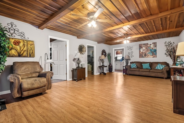 living room with ceiling fan, wood ceiling, light hardwood / wood-style flooring, and beamed ceiling