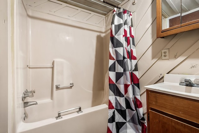 bathroom featuring vanity, wood walls, and shower / bath combination with curtain