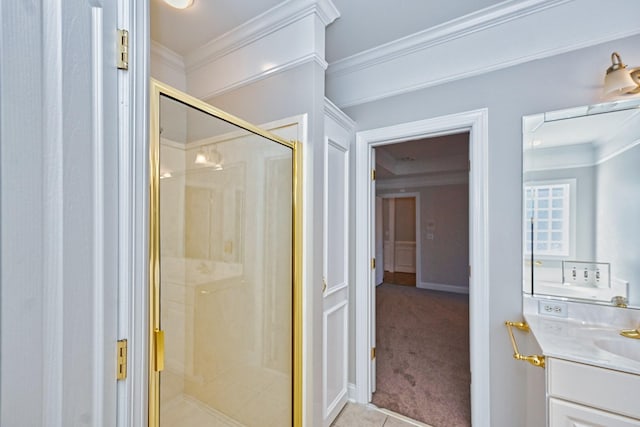 bathroom with vanity, ornamental molding, tile patterned floors, and an enclosed shower