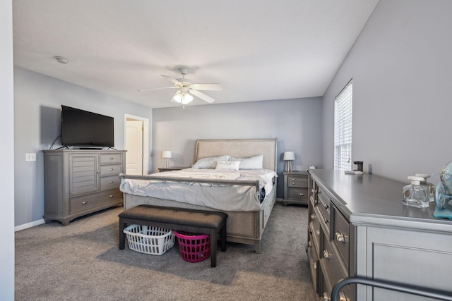 bedroom featuring ceiling fan and carpet floors