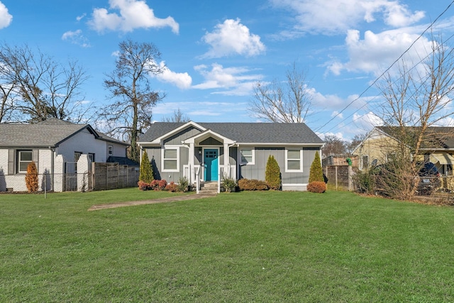 ranch-style house featuring a front lawn