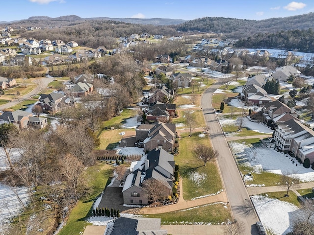 drone / aerial view with a water and mountain view