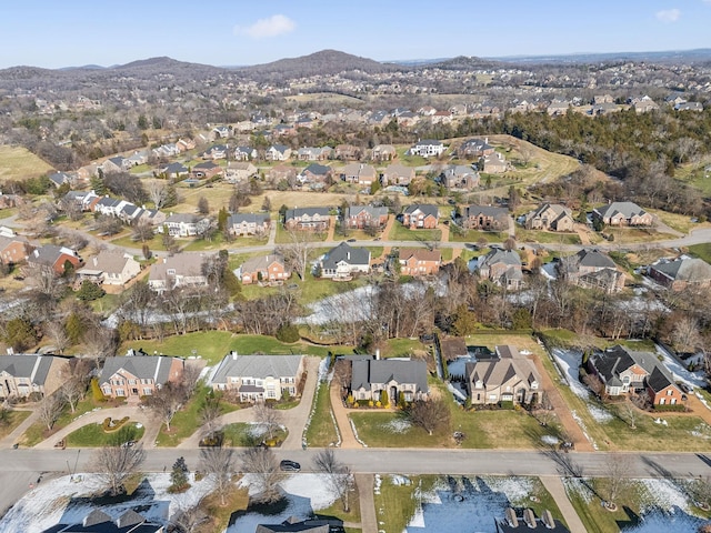 aerial view featuring a water and mountain view