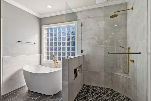 bathroom featuring ornamental molding, shower with separate bathtub, and plenty of natural light