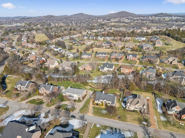 birds eye view of property featuring a mountain view