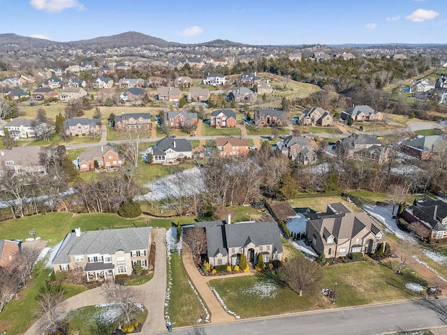 drone / aerial view featuring a mountain view