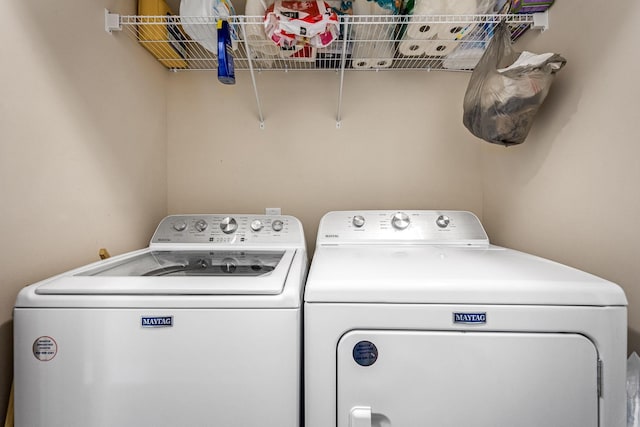 laundry area featuring separate washer and dryer