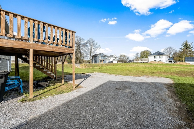 view of yard with a wooden deck