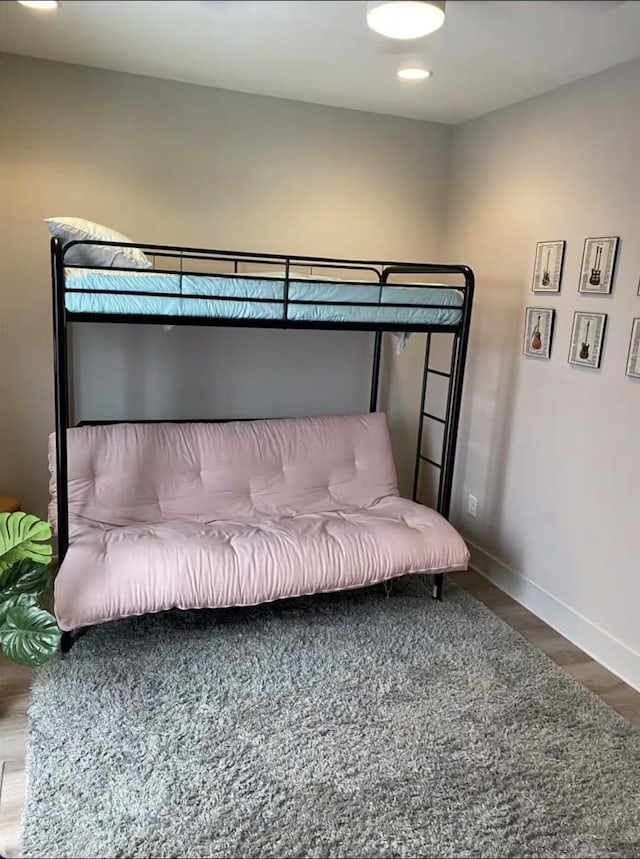 bedroom featuring hardwood / wood-style floors