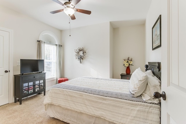 bedroom with ceiling fan and carpet floors