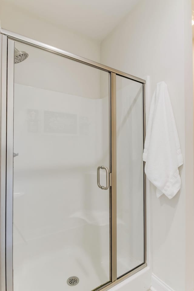 bathroom with an enclosed shower