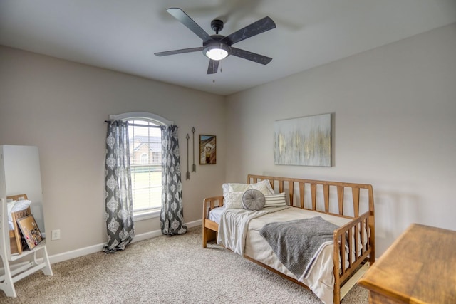 bedroom with ceiling fan and carpet