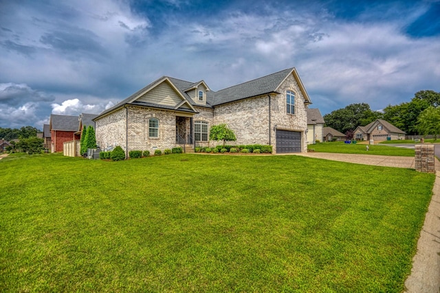 view of front of property featuring a garage and a front yard