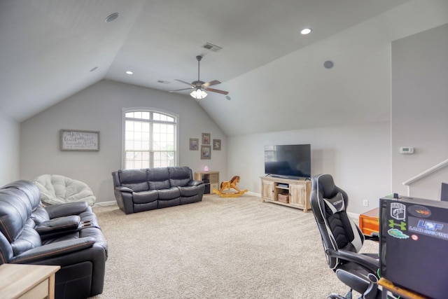 living room with lofted ceiling, ceiling fan, and carpet floors