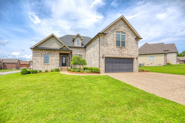 view of front of property with a front lawn and a garage