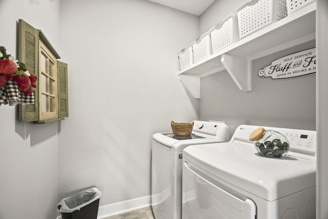 laundry room featuring washing machine and dryer