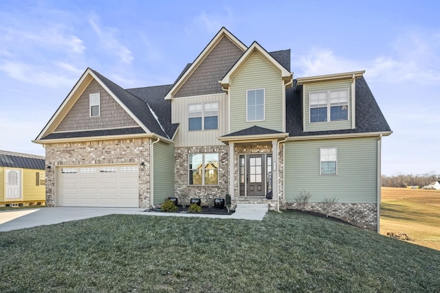 craftsman-style house featuring a garage and a front lawn