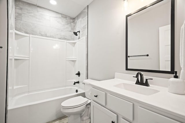 full bathroom featuring tub / shower combination, toilet, and vanity