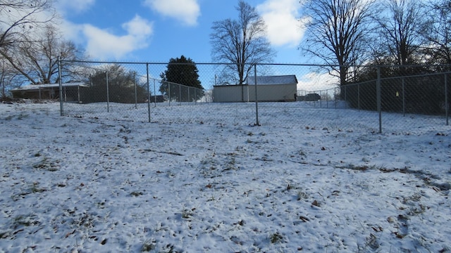 view of yard covered in snow