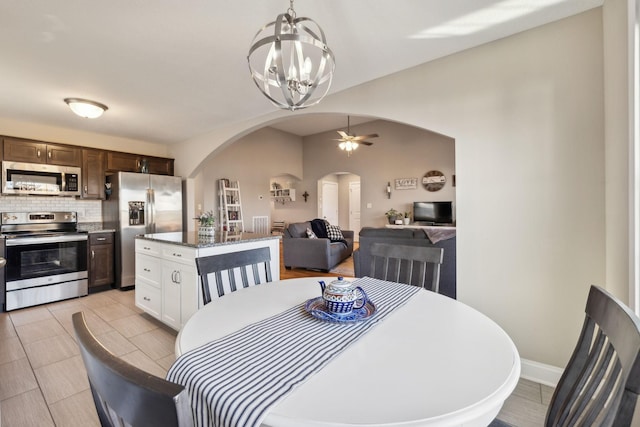 dining room featuring a notable chandelier