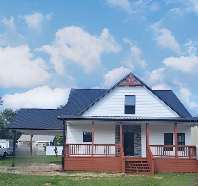 906 Davidson St, Tullahoma, TN 37388 - view of front facade with a porch and metal roof