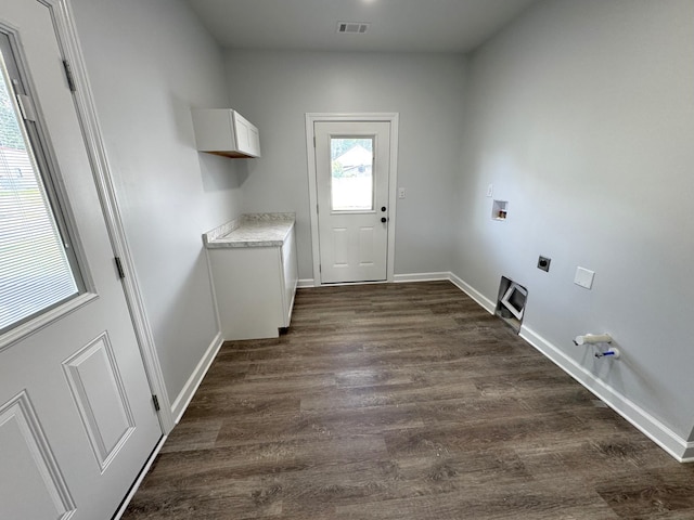 906 Davidson St, Tullahoma, TN 37388 - washroom with electric dryer hookup, washer hookup, dark wood finished floors, baseboards, and gas dryer hookup