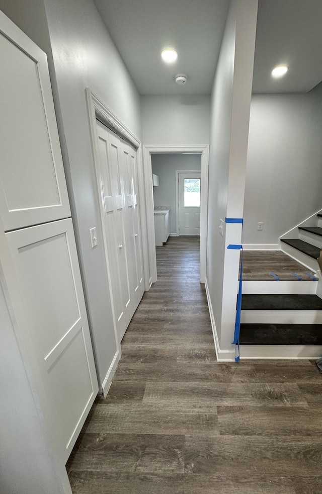 906 Davidson St, Tullahoma, TN 37388 - hall featuring baseboards, dark wood-style floors, stairs, and recessed lighting