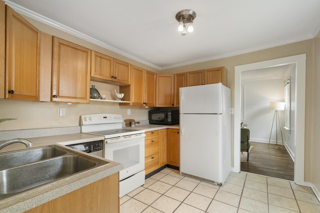 kitchen featuring crown molding, sink, white appliances, and light tile patterned flooring