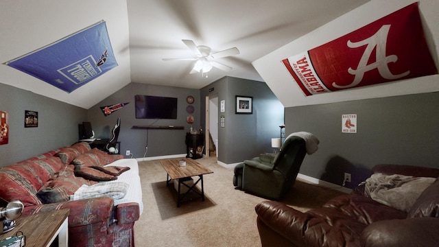 home theater room featuring ceiling fan, carpet floors, and lofted ceiling