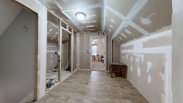 interior space featuring vaulted ceiling