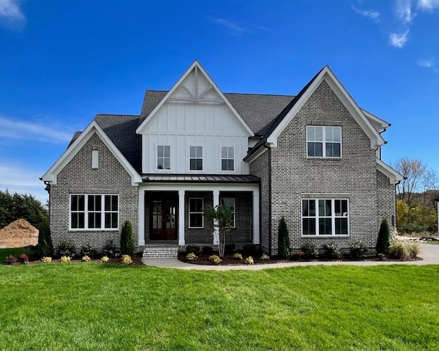 view of front facade featuring a front yard and a porch