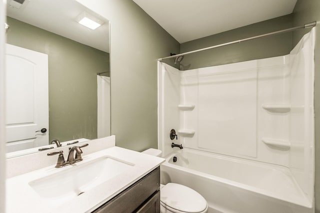 full bathroom with toilet, vanity, and shower / bathtub combination