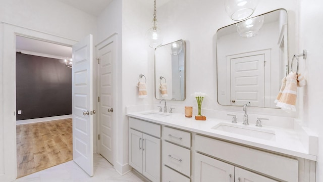 bathroom featuring hardwood / wood-style flooring and vanity